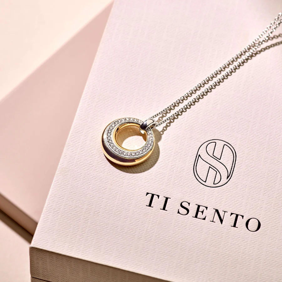 Collana con Pendente tondo in Argento Dorato e Zirconi